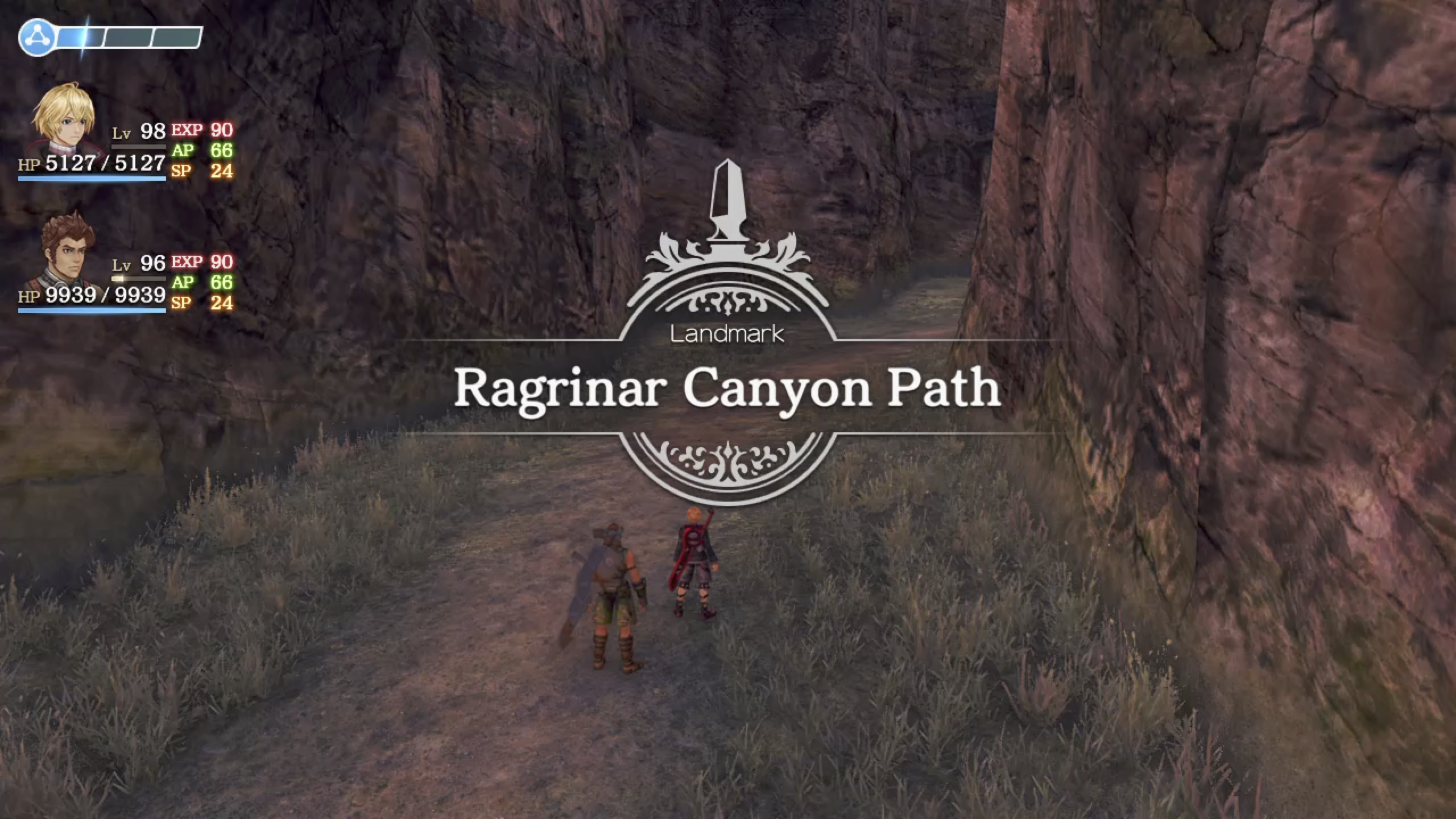 A landmark-discovery notification appears as the party reaches Ragrinar Canyon Path.